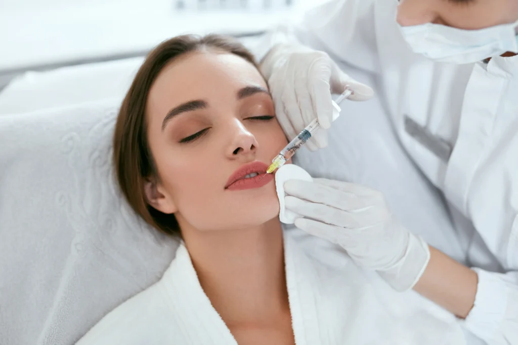 Woman after lip injections in Palm Springs and Orange County, CA showcasing enhanced volume and definition