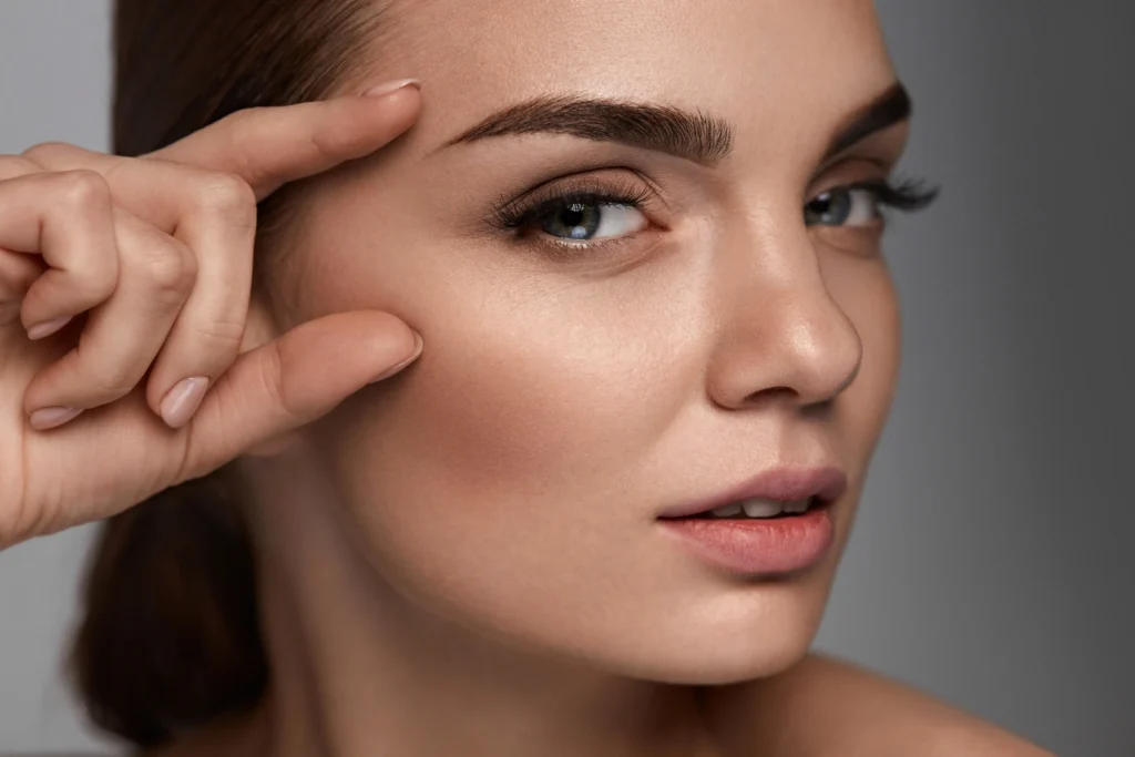 Woman before and after under-eye bags treatment in Palm Springs and Orange County, CA