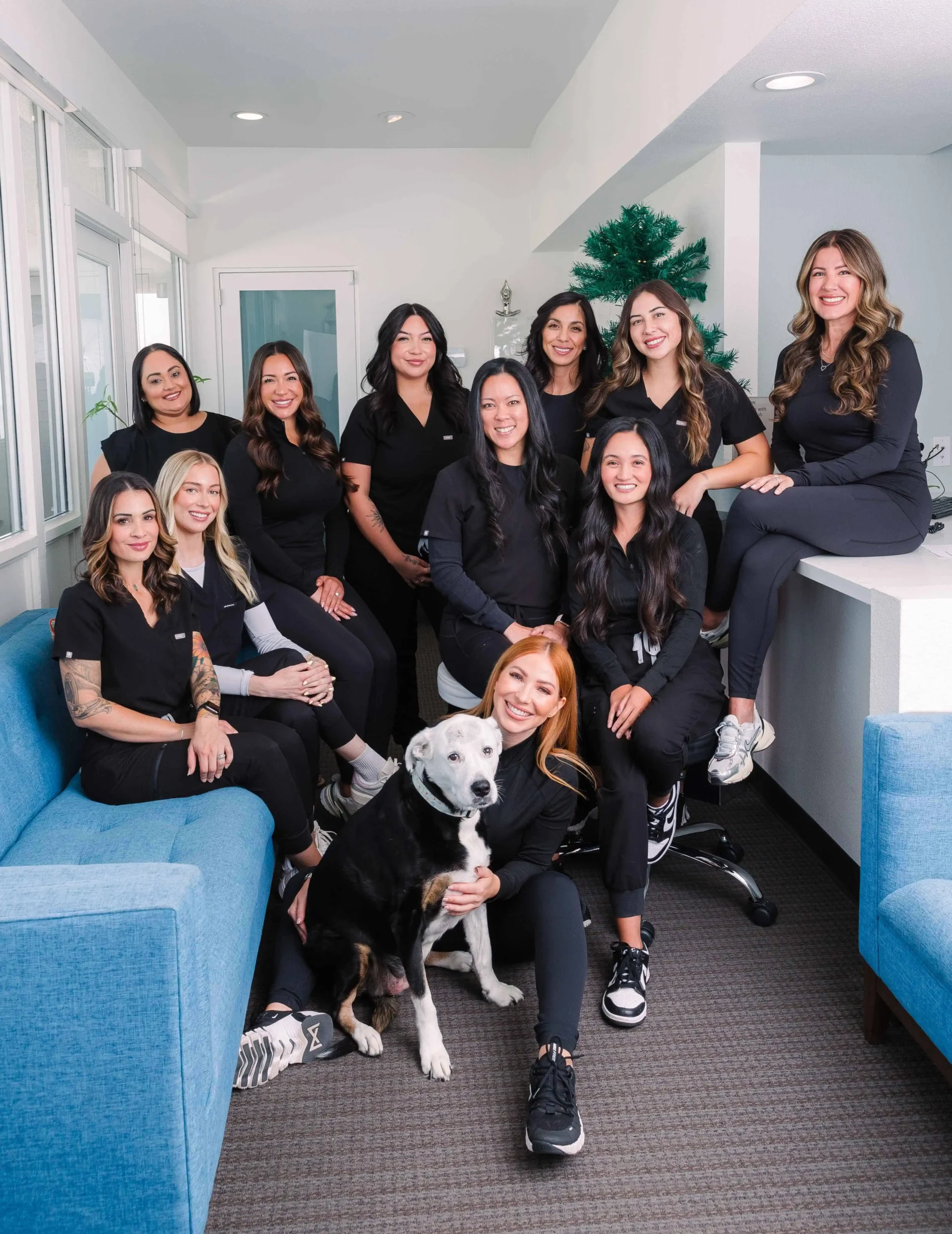 Team photo with Loki at Enve California Aesthetics in Palm Springs, CA